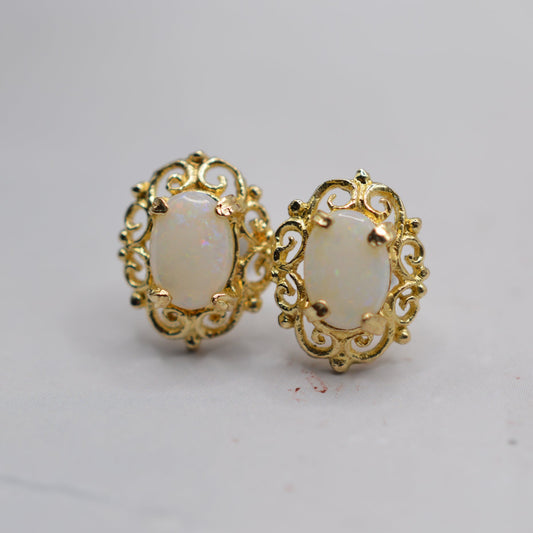9ct Gold Opal Stud Earrings with Swirl Piercings