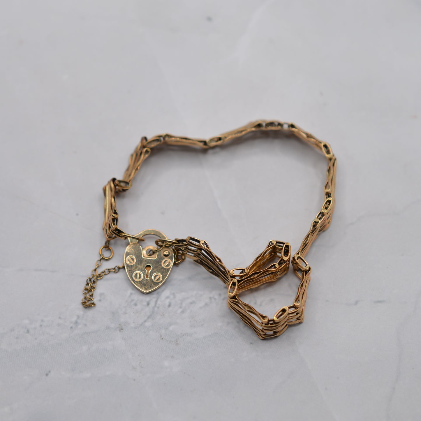1990s 9ct Gold Four-Bar Gate Bracelet with Heart Padlock