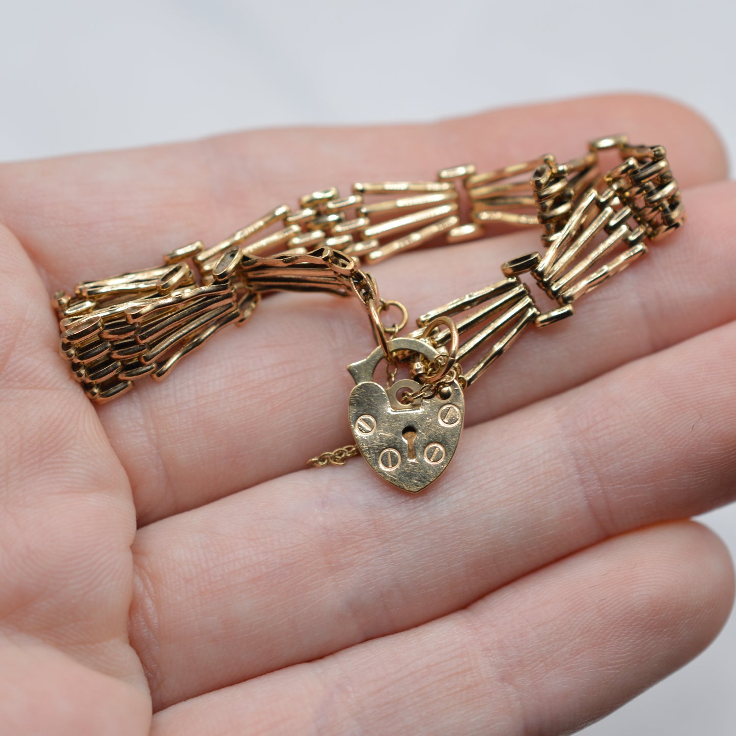 1990s 9ct Gold Four-Bar Gate Bracelet with Heart Padlock