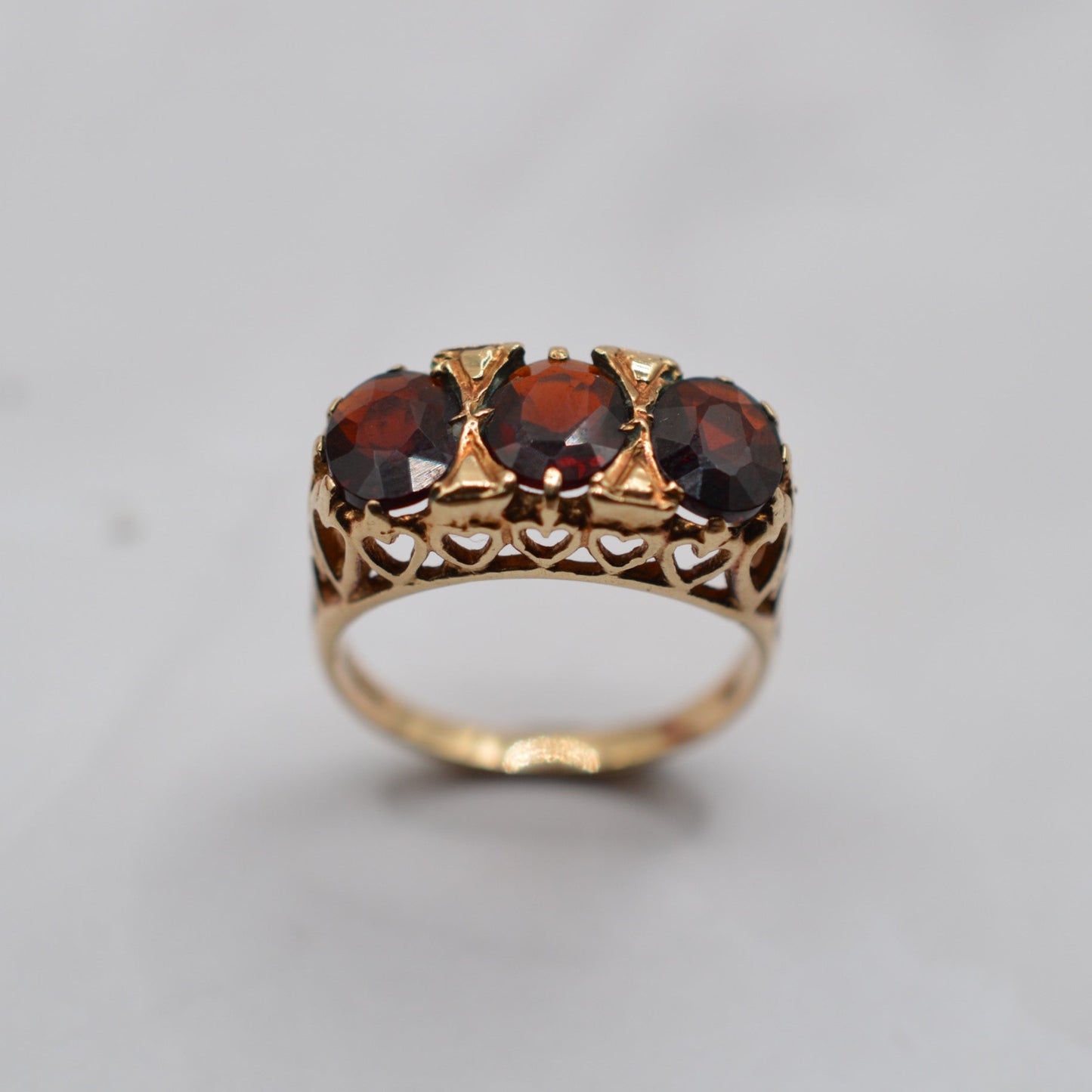 1970s Chunky Vintage 9ct Gold Garnet Trilogy Ring with Heart-Pierced Gallery