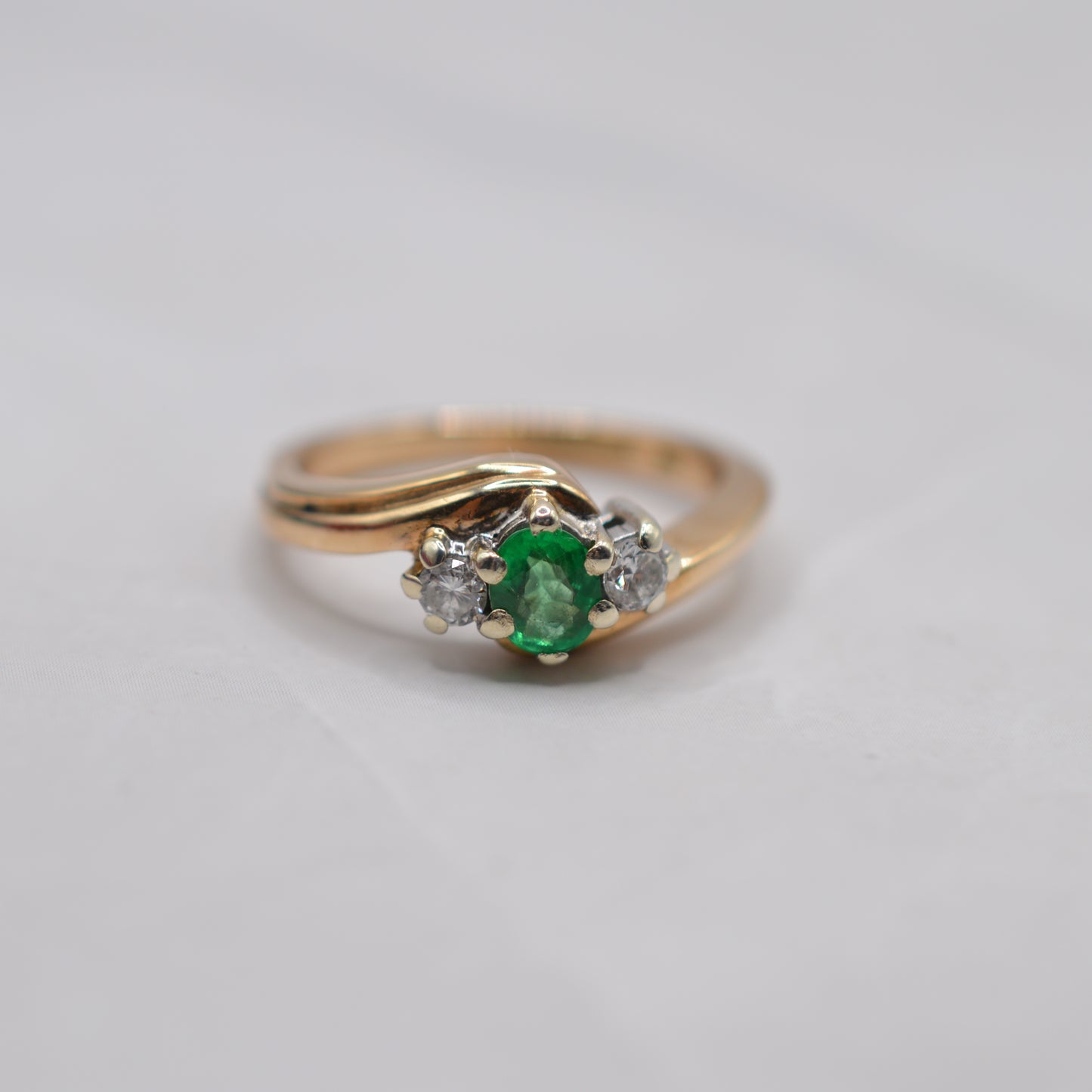 9ct Gold Emerald & Diamond Crossover Trilogy Ring