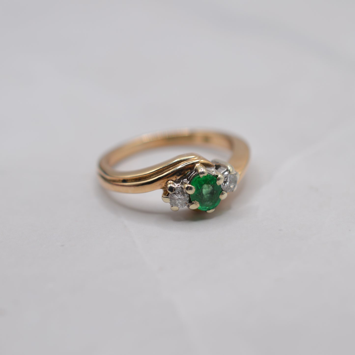 9ct Gold Emerald & Diamond Crossover Trilogy Ring