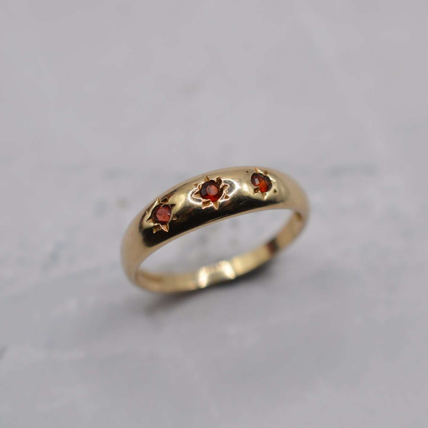 9ct Gold Garnet Trilogy Starburst Gypsy Ring