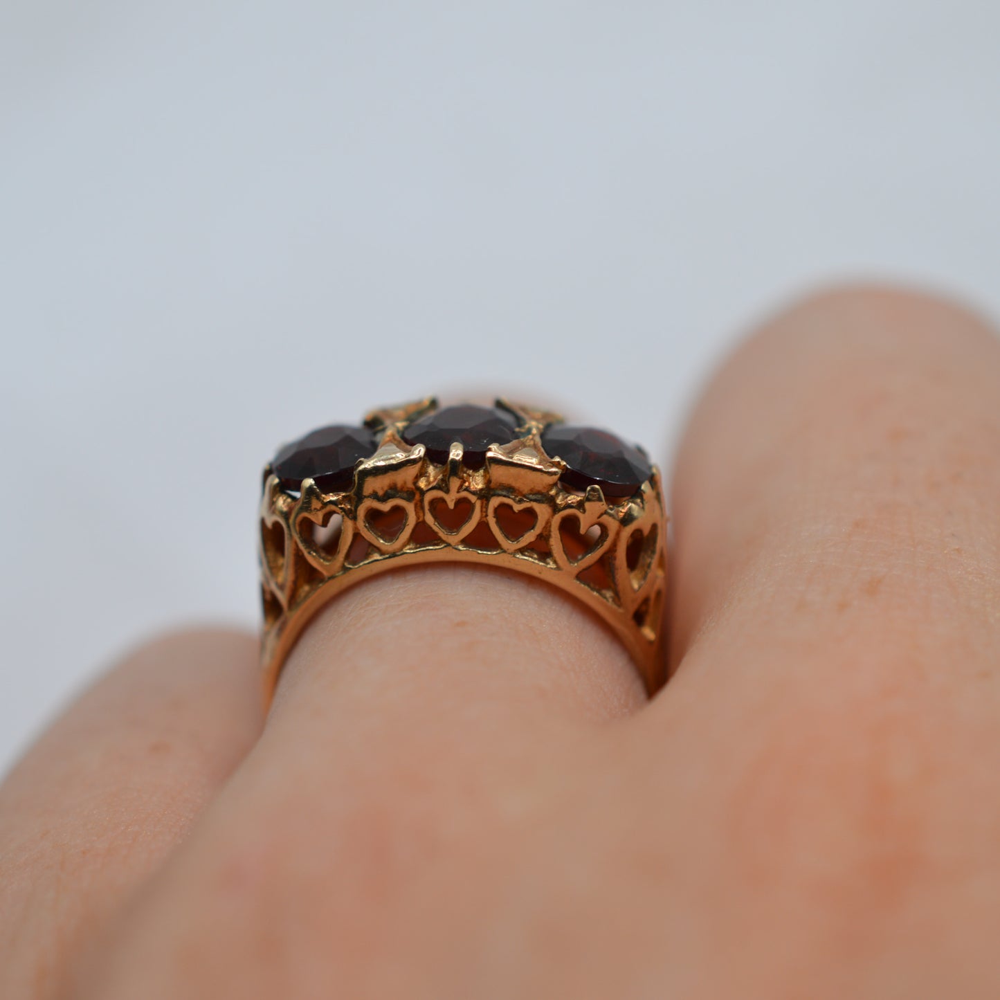 1970s Chunky Vintage 9ct Gold Garnet Trilogy Ring with Heart-Pierced Gallery