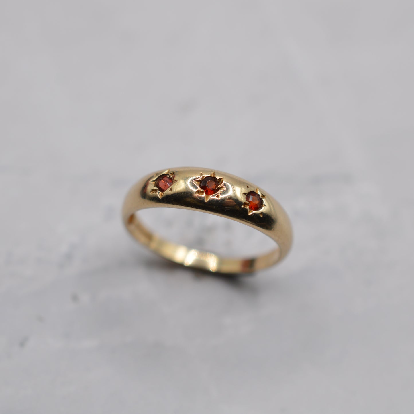 9ct Gold Garnet Trilogy Starburst Gypsy Ring