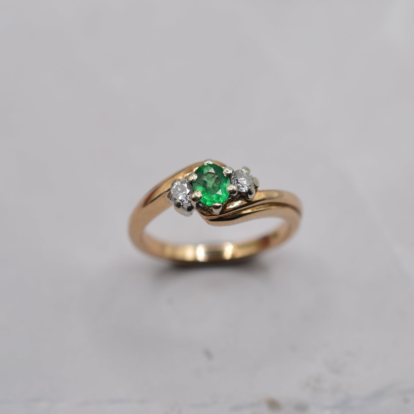 9ct Gold Emerald & Diamond Crossover Trilogy Ring