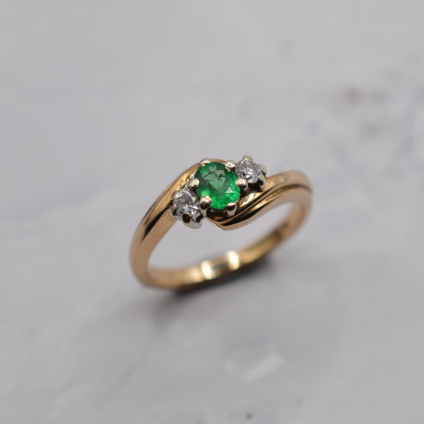 9ct Gold Emerald & Diamond Crossover Trilogy Ring