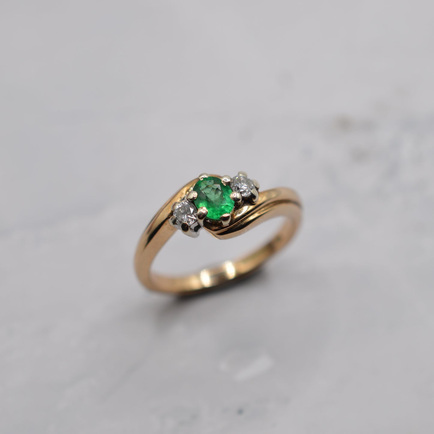 9ct Gold Emerald & Diamond Crossover Trilogy Ring