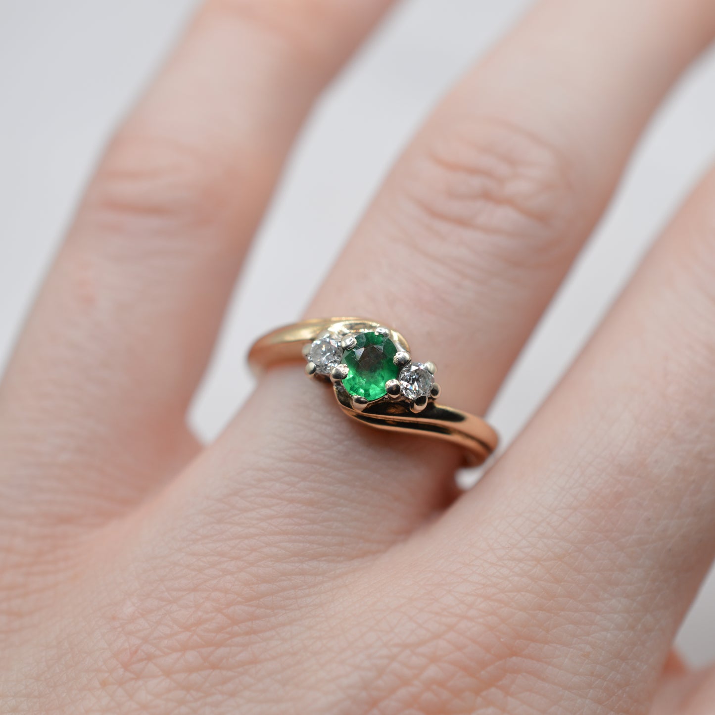 9ct Gold Emerald & Diamond Crossover Trilogy Ring